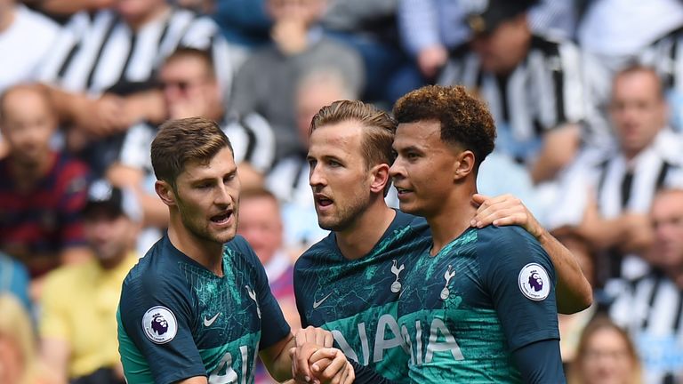 Dele Alli celebrates with teammates after giving Tottenham a 2-1 lead