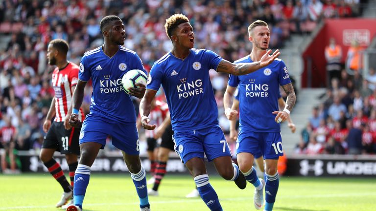 Demarai Gray celebrates with teammates after bringing Leicester level at St Mary's Stadium