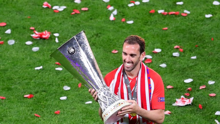 Diego Godin celebrates with the Europa League trophy after final between Olympique Marseille and Atletico Madrid on May 16, 2018