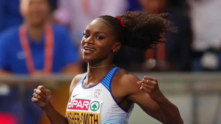 Dina Asher-Smith celebrates winning the Gold medal in the Women's 200m Final during day five of the 24th European Athletics Championships at Olympiastadion on August 11, 2018 in Berlin, Germany.