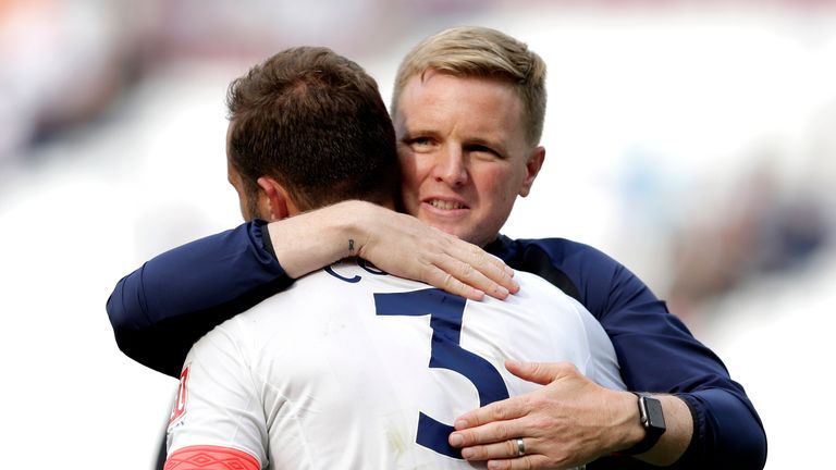 Eddie Howe embraces Steve Cook, whose header proved to be the winner at the London Stadium