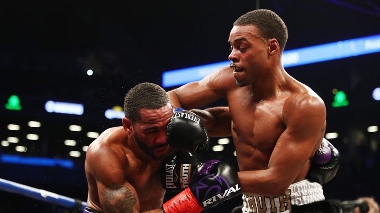 Errol Spence punches Lamont Peterson during their IBF Welterweight title fight at the Barclays Center on January 20, 2018 in New York City.