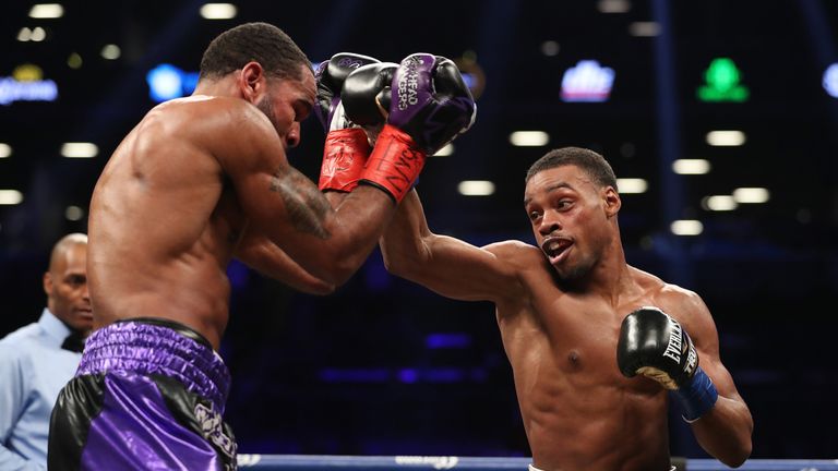 Errol Spence punches Lamont Peterson during their IBF Welterweight title fight at the Barclays Center on January 20, 2018 in New York City. 