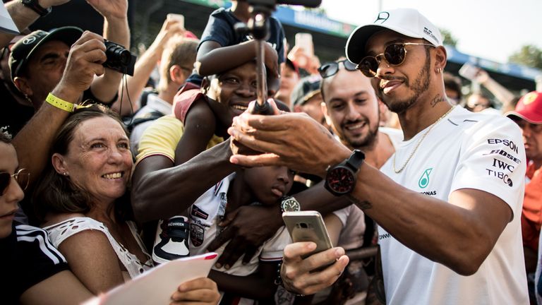 Hamilton immediately greeted the fans after his late arrival at Monza