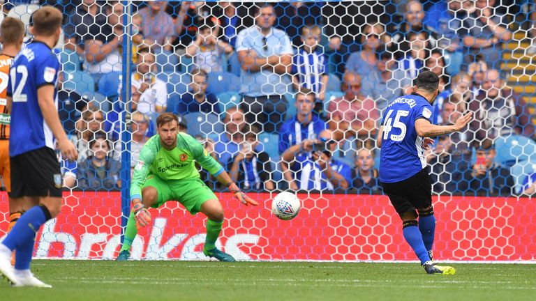 Sheffield Wednesday's Fernando Forestieri calmly slots home his penalty shot 