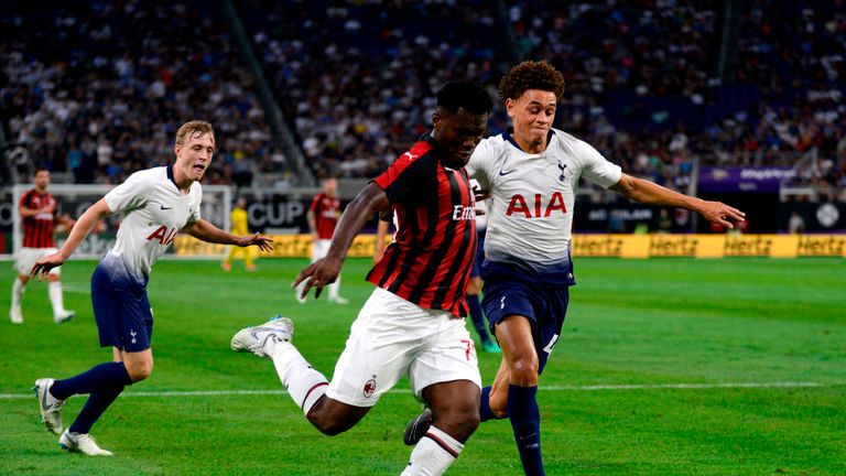 AC Milan's Franck Kessie and Tottenham's Luke Amos in action during the 2018 International Champions Cup at US Bank Stadium