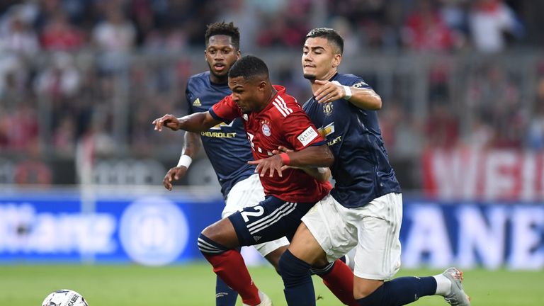 Manchester United's Brazilian Fred, Bayern Munich midfielder Serge Gnabry and United midfielder Andreas Pereira vie for the ball during the pre-season friendly football match between FC Bayern Munich and Manchester United at the Allianz Arena in Munich, southern Germany on August 5, 2018