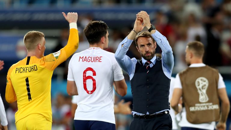 Gareth Southgate applauds fans after the group G match against Belgium