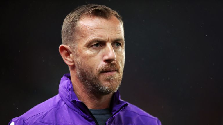 Stoke City manager Gary Rowett appears dejected at half-time with his team losing 2-0