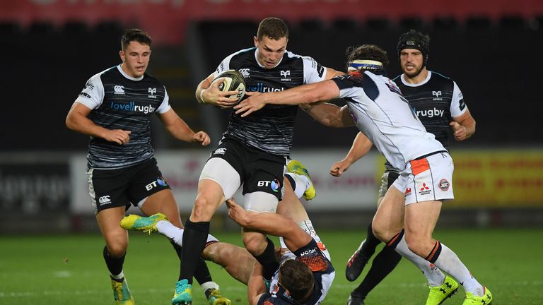 Guinness PRO14, Liberty Stadium, Wales 31/8/2018.Ospreys vs Edinburgh.Ospreys' George North takes on Matt Scott of Edinburgh .Mandatory Credit ..INPHO/Alex Davidson