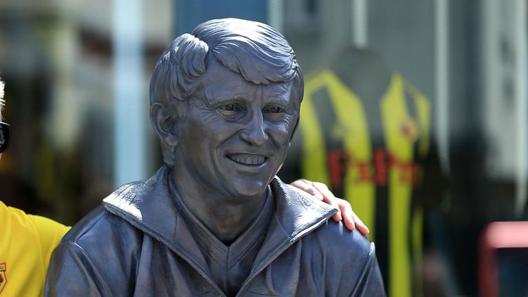 Fans pose for a photograph as a statue of former Manager Graham Taylor is unveiled ahead of the pre-season friendly match between Watford and Sampdoria at Vicarage Road on August 4, 2018 in Watford, England.