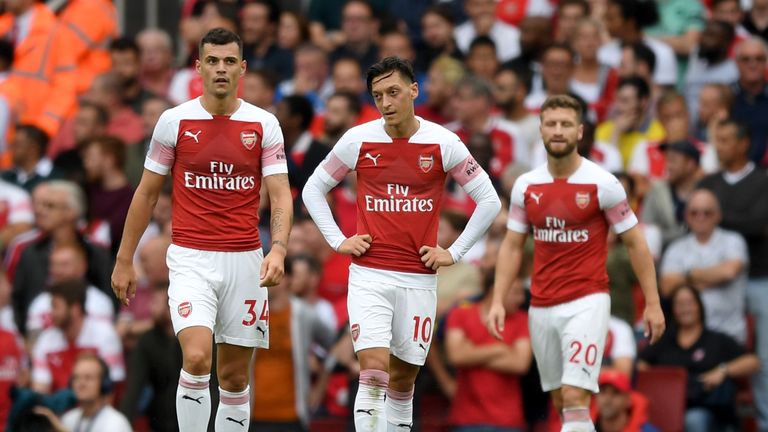 Arsenal's Granit Xhaka, Mesut Ozil and Shkodran Mustafi during the 2-0 home defeat to Manchester City
