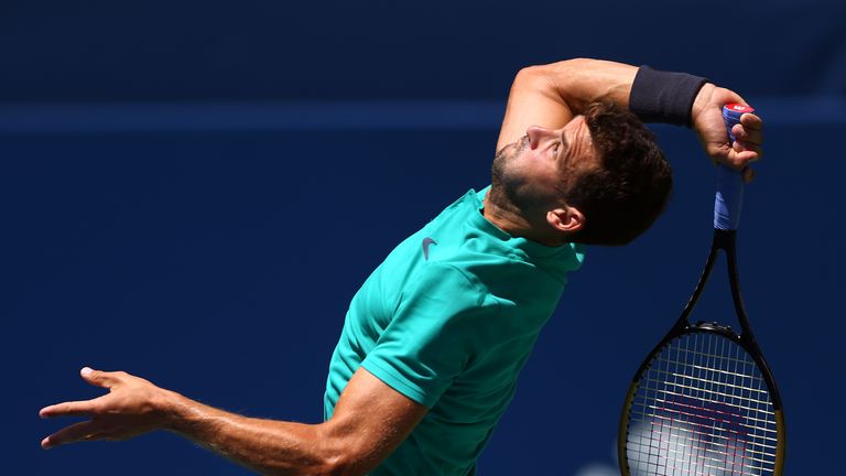 Grigor Dimitrov of Bulgaria serves against Kevin Anderson of South Africa during a quarter final match on Day 5 of the Rogers Cup at Aviva Centre on August 10, 2018 in Toronto, Canada.
