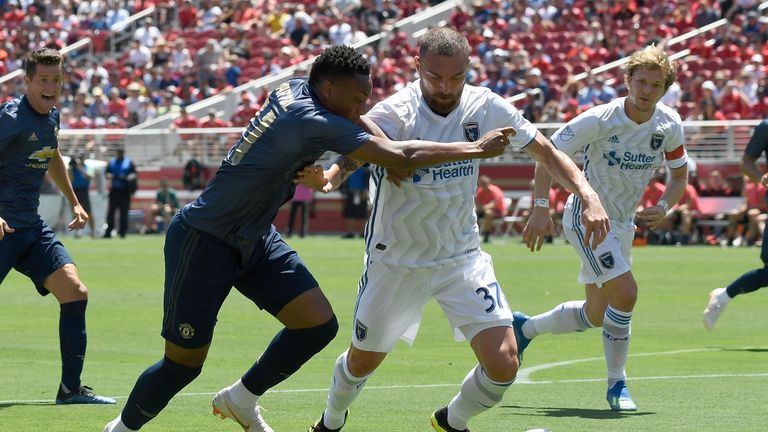Manchester United's Anthony Martial battles for control of the ball with Guram Kashia of the San Jose Earthquakes during the pre-season friendly at Levi's Stadium