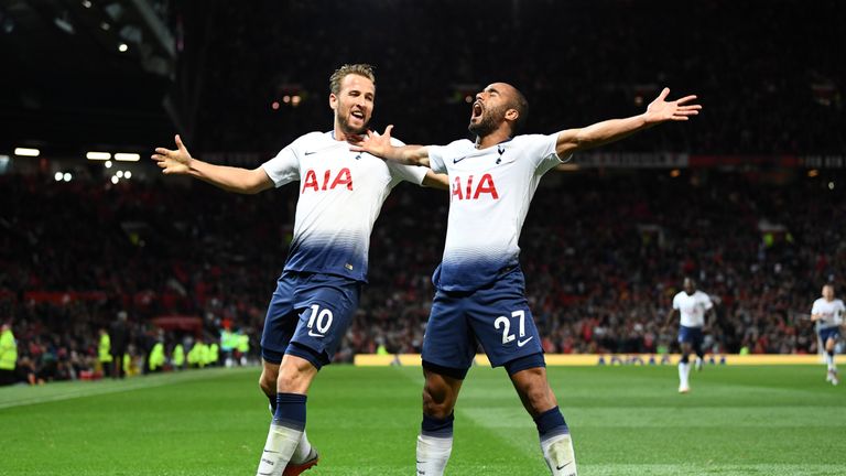 Harry Kane and Lucas Moura during the Premier League match between Manchester United and Tottenham Hotspur at Old Trafford on August 27, 2018 in Manchester, United Kingdom