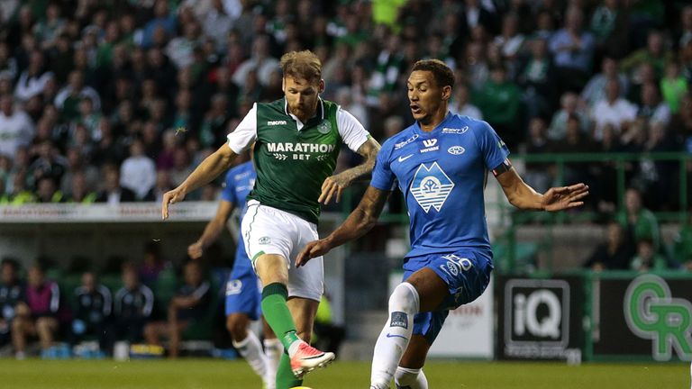 Hibernian's Martin Boyle (left) battles for possession with Molde's Ruben Gabrielsen 