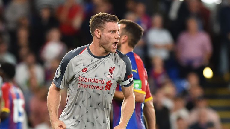 James Milner celebrates his opening goal against Crystal Palace