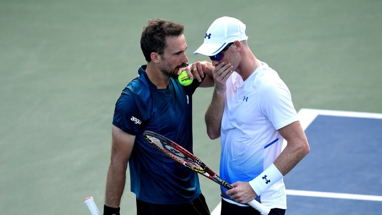 Jamie Murray of Great Britain and Bruno Soares of Brazil talk against Guido Pella of Argentina and Albert Ramos-Vinolas of Spain during the men's doubles first round match on Day Four of the 2018 US Open at the USTA Billie Jean King National Tennis Center on August 30, 2018 in the Flushing neighborhood of the Queens borough of New York City. 