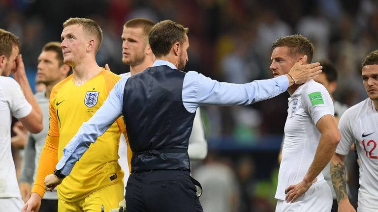 Gareth Southgate, Manager of England consoles Jordan Pickford, Jamie Vardy of England following their sides defeat in the 2018 FIFA World Cup Russia Semi Final match between England and Croatia at Luzhniki Stadium on July 11, 2018 in Moscow, Russia. 