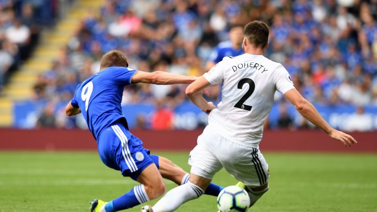 Jamie Vardy was sent off after a strong tackle on Matt Doherty in Leicester's win