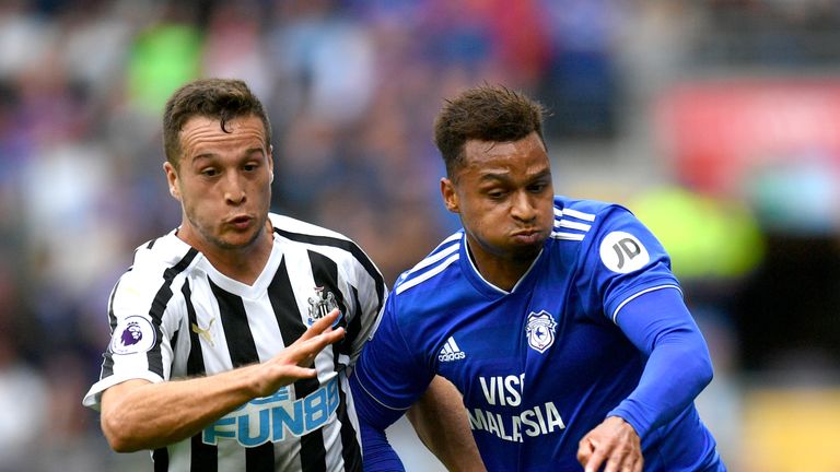 Javier Manquillo of Newcastle United battles for possession with Josh Murphy of Cardiff City
