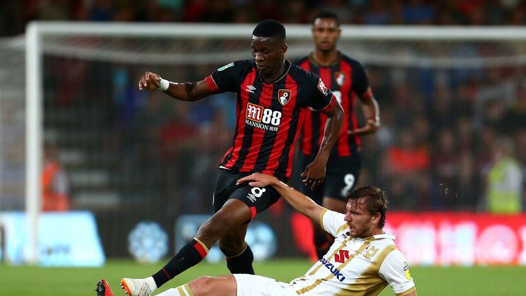 Alex Gilbey of MK Dons tackles Bournemouth debutant Jefferson Lerma during the Carabao Cup, Second Round 