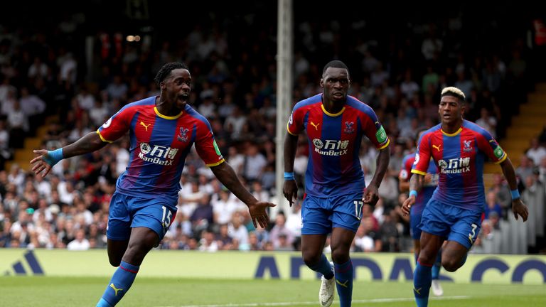 Jeffrey Schlupp wheels away from goal after scoring the first goal of the game at Craven Cottage 
