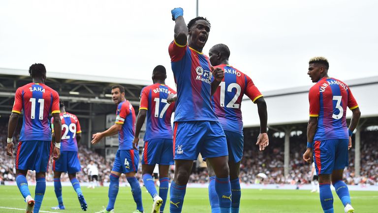 Jeffrey Schlupp pumps his fist in celebration after giving Crystal Palace a 1-0 lead