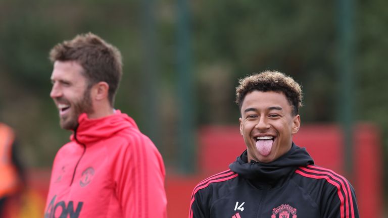 Jesse Lingard is pictured joking around during first team training at Manchester United's Aon Training Complex
