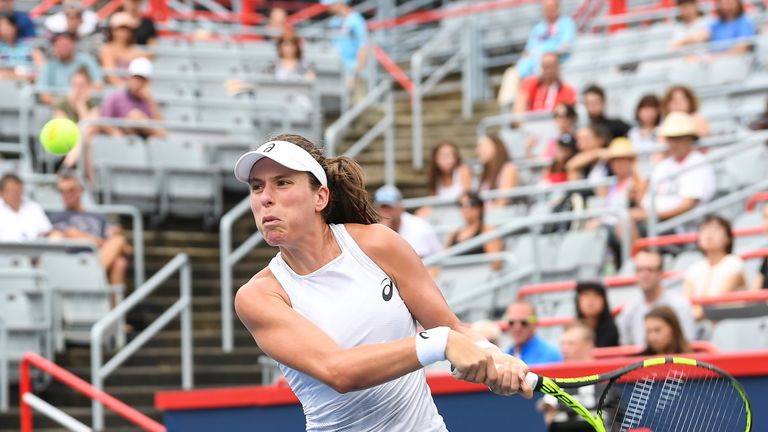 Johanna Konta of Australia prepares to hit a return against Jelena Ostapenko of Latvia during day two of the Rogers Cup at IGA Stadium on August 7, 2018 in Montreal, Quebec, Canada
