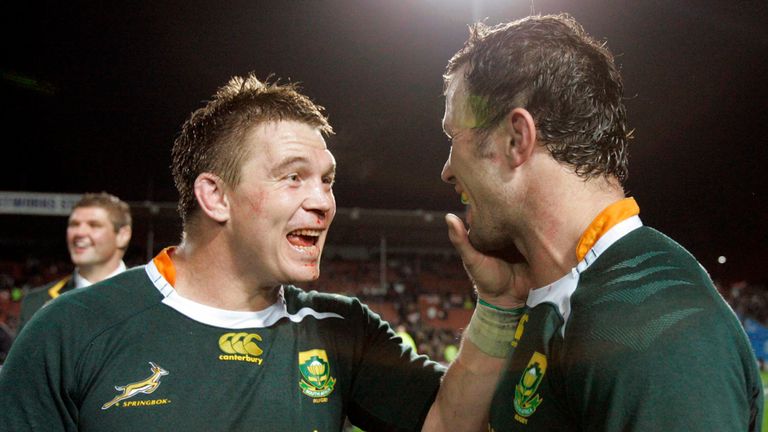 HAMILTON, NEW ZEALAND - SEPTEMBER 12, John Smit and Bismarck du Plessis celebrate after the Tri-Nations rugby match between New Zealand and South Africa on September 12, 2009 at Waikato Stadium in Hamilton, New Zealand..Photo by Tertius Pickard / Gallo Images
