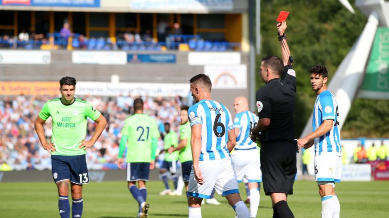Jonathan Hogg is shown a red card by referee Michael Oliver