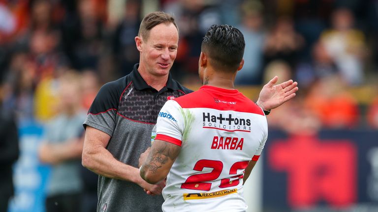 St Helens' head coach Justin Holbrook and Ben Barba celebrate a Betfred Super League win.