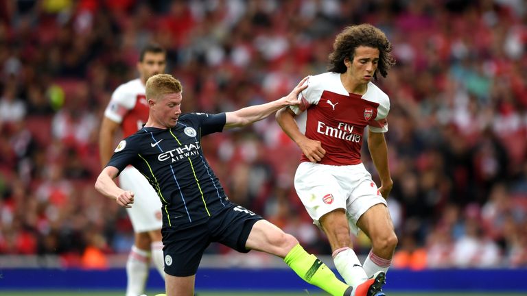 Kevin De Bruyne puts in a challenge on Matteo Guendouzi at the Emirates Stadium on Sunday