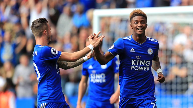 Leicester City's Demarai Gray (right) celebrates after Wolves' Matt Doherty (not pictured) scores an own goal during the Premier League match at the King Power Stadium, Leicester