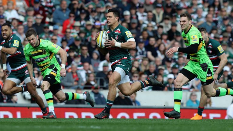 Matt Toomua attacking for Leicester Tigers during a derby match against Northampton Saints 