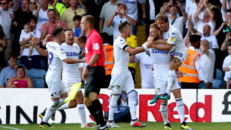 Leeds United's Liam Cooper (second right) celebrates scoring his side's third goal of the game v Stoke City with his team-mates during the Sky Bet Championship match at Elland Road, Leeds