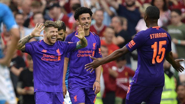 DUBLIN, IRELAND - AUGUST 04: Alberto Moreno of Liverpool celebrates with team mates after scoring during the international friendly game between Liverpool and Napoli at Aviva Stadium on August 4, 2018 in Dublin, Ireland. (Photo by Charles McQuillan/Getty Images)