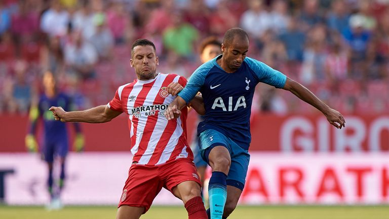 Lucas Moura and Alex Granell battle for the ball during a pre-season friendly 