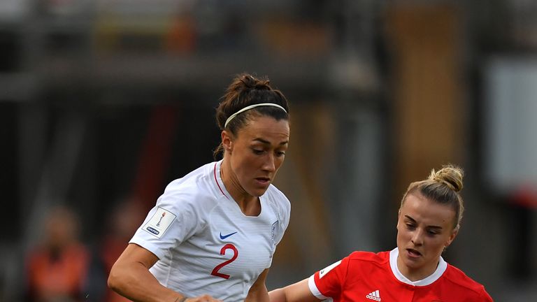 Lucy Bronze holds off Kylie Nolan 