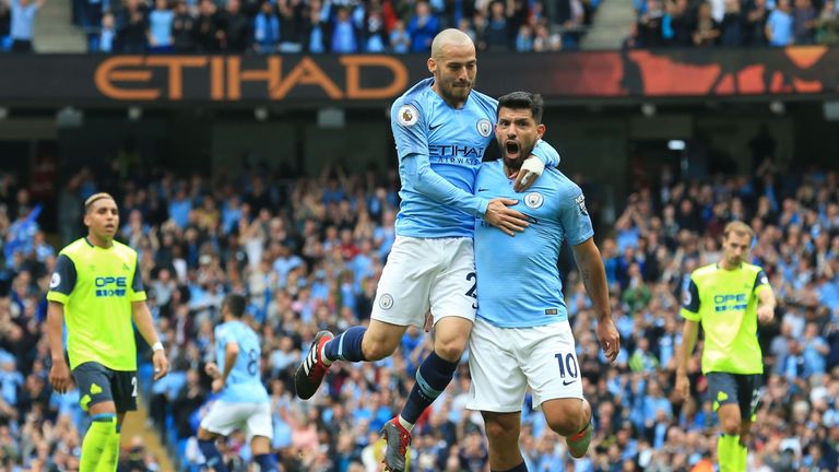 Sergio Aguero celebrates with David Silva