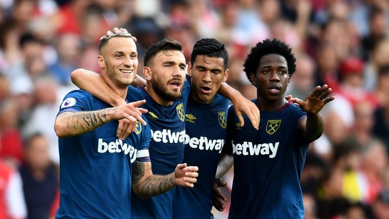 Marko Arnautovic celebrates his opener at the Emirates Stadium