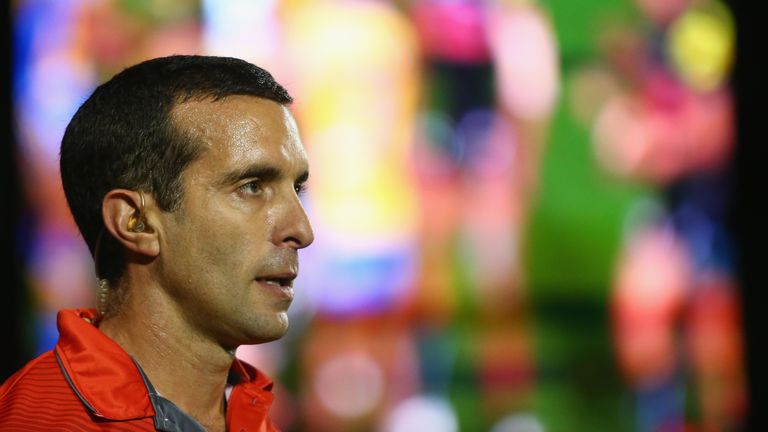 Referee Matt Cecchin waits for the video referee decision during the round 12 NRL match between Penrith Panthers and the Parramatta Eels at Pepper Stadium on May 29, 2015 in Sydney, Australia.