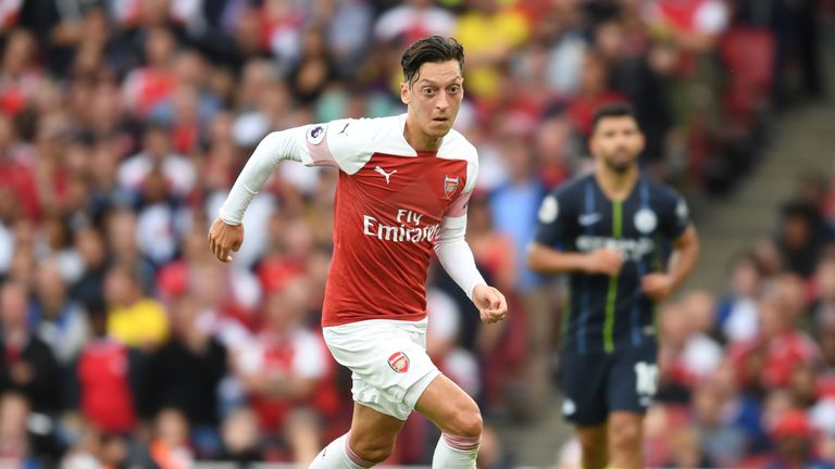 Mesut Ozil in action during the Premier League match between Arsenal and Manchester City