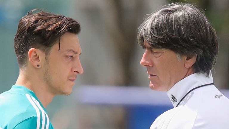 Joachim Loew, head coach of Germany talks to his palyer Mesut Oezil during the Germany training session ahead of the 2018 FIFA World Cup at CSKA Sports Base on June 13, 2018 in Moscow, Russia.