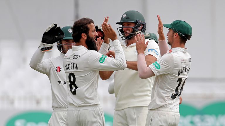 Worcestershire's Moeen Ali is congratulated after taking the wicket of Yorkshire's Kane Williamson during day one of the Specsavers Championship Division One match between Yorkshire and Worcestershire at North Marine Road on August 19, 2018 in Scarborough, England. (Photo by Richard Sellers/Getty Images)