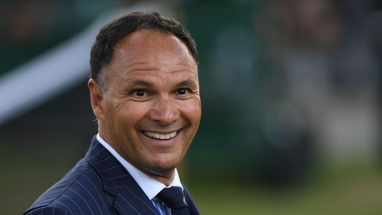Swedish umpire Mohamed Lahyani smiles at The All England Tennis Club in Wimbledon, southwest London, on July 4, 2018, on the third day of the 2018 Wimbledon Championships tennis tournament