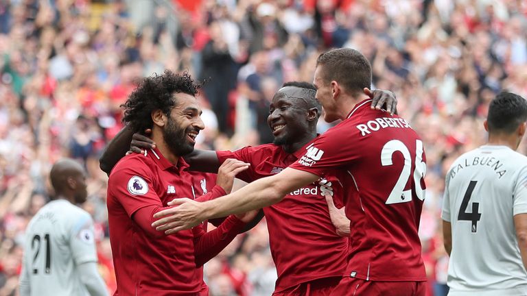 Liverpool's Mohamed Salah celebrates scoring his side's first goal of the game