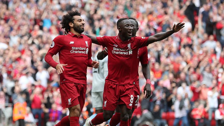 Liverpool's Mohamed Salah celebrates scoring his side's first goal of the game with Naby Keita