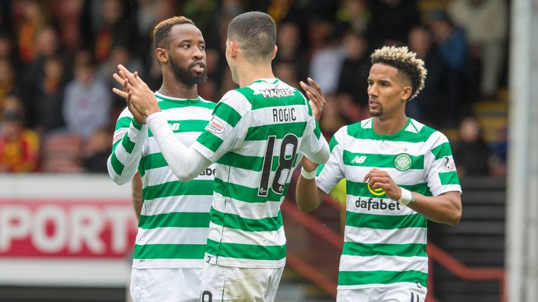 Celtic's Moussa Dembele (left) celebrates scoring his side's second goal of the game during the Betfed Cup Second Round match at the Energy Check Stadium